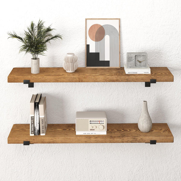 a pair of wooden shelves mounted on a wall, displaying various decorative items such as a plant, a clock, a book, and a radio.