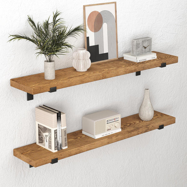 a pair of wooden shelves mounted on a wall, displaying various decorative items such as a plant, a vase, a clock, and books.